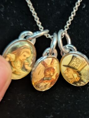 Vintage Style Alice In Wonderland Necklace With Silver Colored Chain